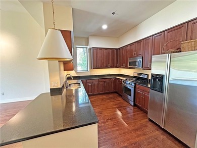 Sophisticated luxury and amenities abound in this rare to find