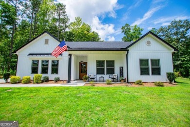 Lake Home For Sale in Villa Rica, Georgia