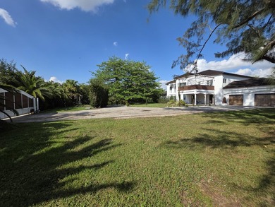 Situated on an expansive 2.23-acre estate, this exceptional - photo 4