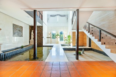 Situated on an expansive 2.23-acre estate, this exceptional - photo 5