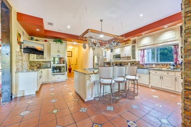 Situated on an expansive 2.23-acre estate, this exceptional - photo 9