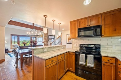 Penthouse Perfection with Panoramic Lake, Golf Course & Mountain - photo 11
