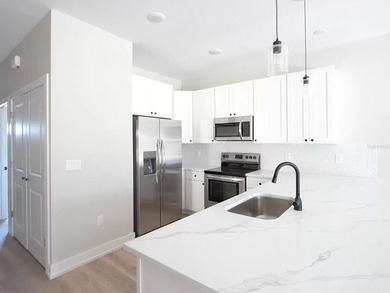 Newly upgraded with lots of natural light, this 3-bedroom - photo 3