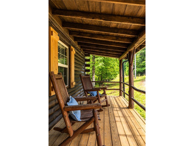 True Ozark living in a real log home that comes with a boat slip - photo 5
