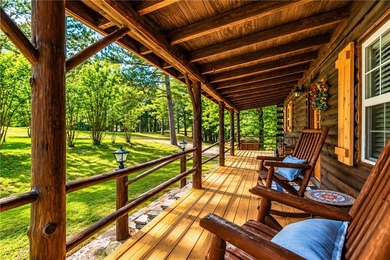 True Ozark living in a real log home that comes with a boat slip - photo 6