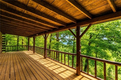 True Ozark living in a real log home that comes with a boat slip - photo 7
