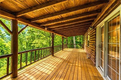 True Ozark living in a real log home that comes with a boat slip - photo 8