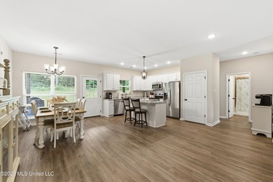 Better than New ~ Built in 2023 ~ 4 Bedroom 3 Bath Home with - photo 6