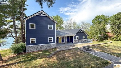 Experience luxury lake living at its finest in this stunning - photo 1