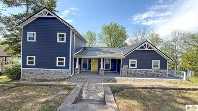 Experience luxury lake living at its finest in this stunning - photo 3