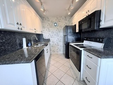 Welcome to this charming two-bedroom, one-and-a-half-bath - photo 1