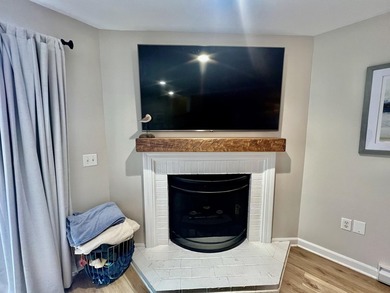Enjoy serene pond views from this sunny and beautifully updated - photo 11