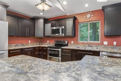Experience the best of Lake of the Ozarks living in this - photo 17