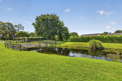 Lake Wellington Townhome/Townhouse Active Under Contract in Wellington Florida
