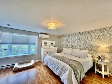 Enjoy serene pond views from this sunny and beautifully updated - photo 24