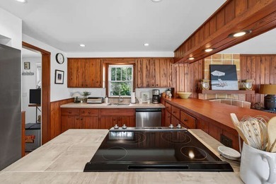 A rare riverfront sanctuary spanning 5 acres with approximately - photo 12