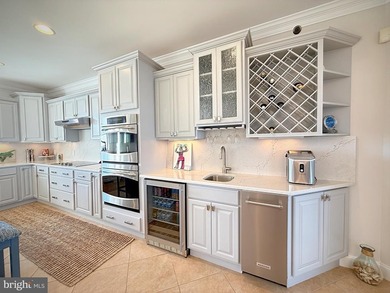 Perfectly positioned along the bay just moments from the beaches - photo 12