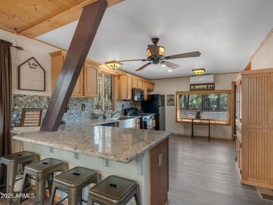Nestled among towering pines on two combined lots totaling over - photo 14