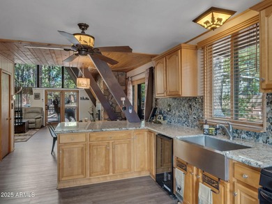 Nestled among towering pines on two combined lots totaling over - photo 16