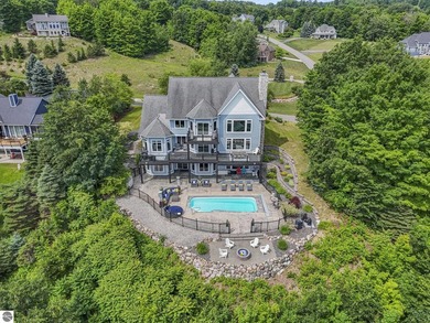 Two miles from downtown Traverse City, this 5,883 square foot - photo 3