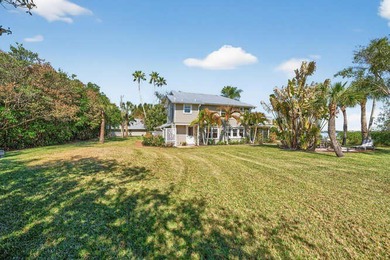 A rare riverfront sanctuary spanning 5 acres with approximately - photo 26