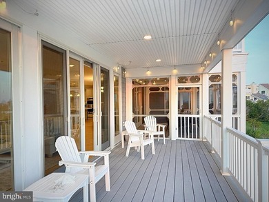 Perfectly positioned along the bay just moments from the beaches - photo 29