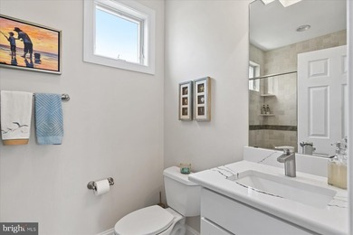 Perfectly positioned along the bay just moments from the beaches - photo 34