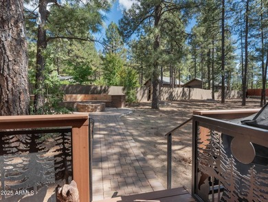 Nestled among towering pines on two combined lots totaling over - photo 35