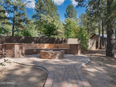 Nestled among towering pines on two combined lots totaling over - photo 36