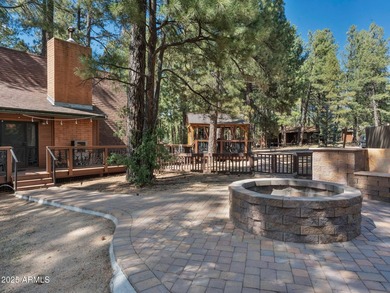 Nestled among towering pines on two combined lots totaling over - photo 37
