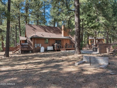 Nestled among towering pines on two combined lots totaling over - photo 39