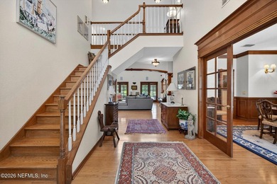Situated on an oversized corner lot framed by mature oaks, this - photo 8