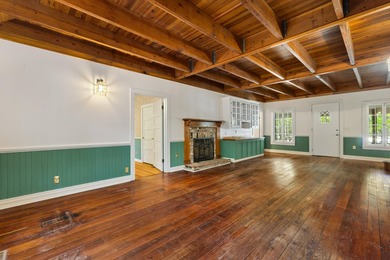 Hidden beneath towering hardwoods on a private wooded setting - photo 9