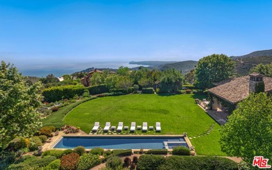 Tucked away behind gates atop the Malibu hills, this enchanting - photo 4