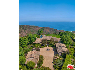 Tucked away behind gates atop the Malibu hills, this enchanting - photo 5