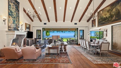 Tucked away behind gates atop the Malibu hills, this enchanting - photo 10