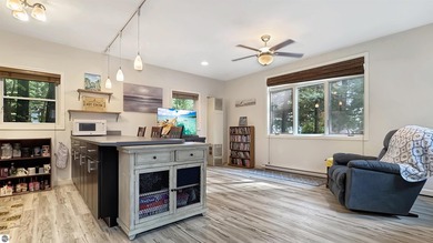 This two-bedroom, one-bath home is located across the street - photo 7