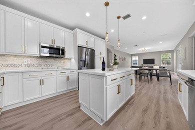 GORGEOUS LAKE FRONT HOME IN THE HIGHLY DESIRABLE GATED COMMUNITY - photo 17