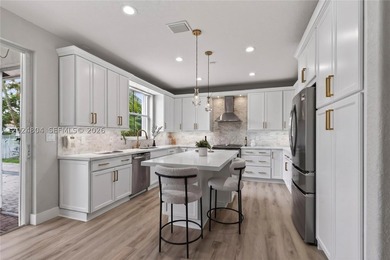 GORGEOUS LAKE FRONT HOME IN THE HIGHLY DESIRABLE GATED COMMUNITY - photo 18