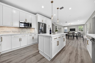 GORGEOUS LAKE FRONT HOME IN THE HIGHLY DESIRABLE GATED COMMUNITY - photo 19