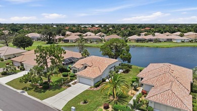 Panoramic pond and 10th fairway views, soaring ceilings, and - photo 3