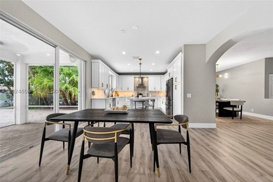 GORGEOUS LAKE FRONT HOME IN THE HIGHLY DESIRABLE GATED COMMUNITY - photo 24