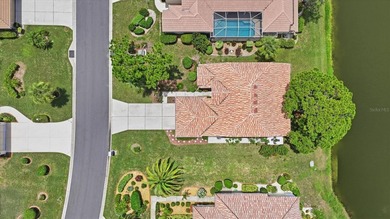 Panoramic pond and 10th fairway views, soaring ceilings, and - photo 5