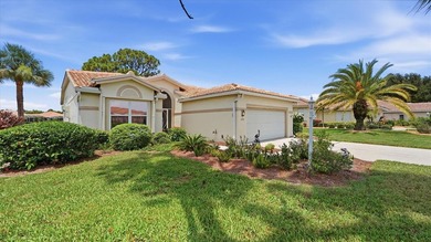 Panoramic pond and 10th fairway views, soaring ceilings, and - photo 7