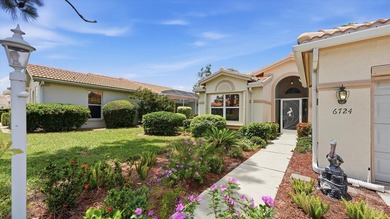Panoramic pond and 10th fairway views, soaring ceilings, and - photo 8
