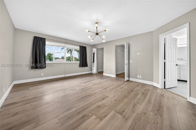 GORGEOUS LAKE FRONT HOME IN THE HIGHLY DESIRABLE GATED COMMUNITY - photo 31