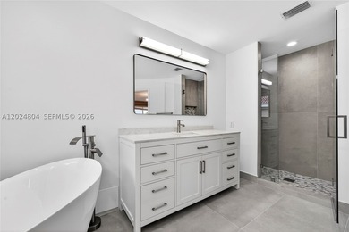 GORGEOUS LAKE FRONT HOME IN THE HIGHLY DESIRABLE GATED COMMUNITY - photo 33