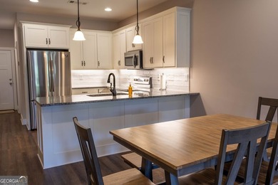 Welcome home to this amazing townhouse inside the city limits of - photo 16