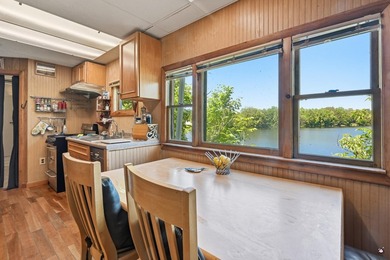 A rare opportunity to enjoy spacious riverfront living in the - photo 26
