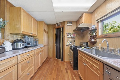 A rare opportunity to enjoy spacious riverfront living in the - photo 27